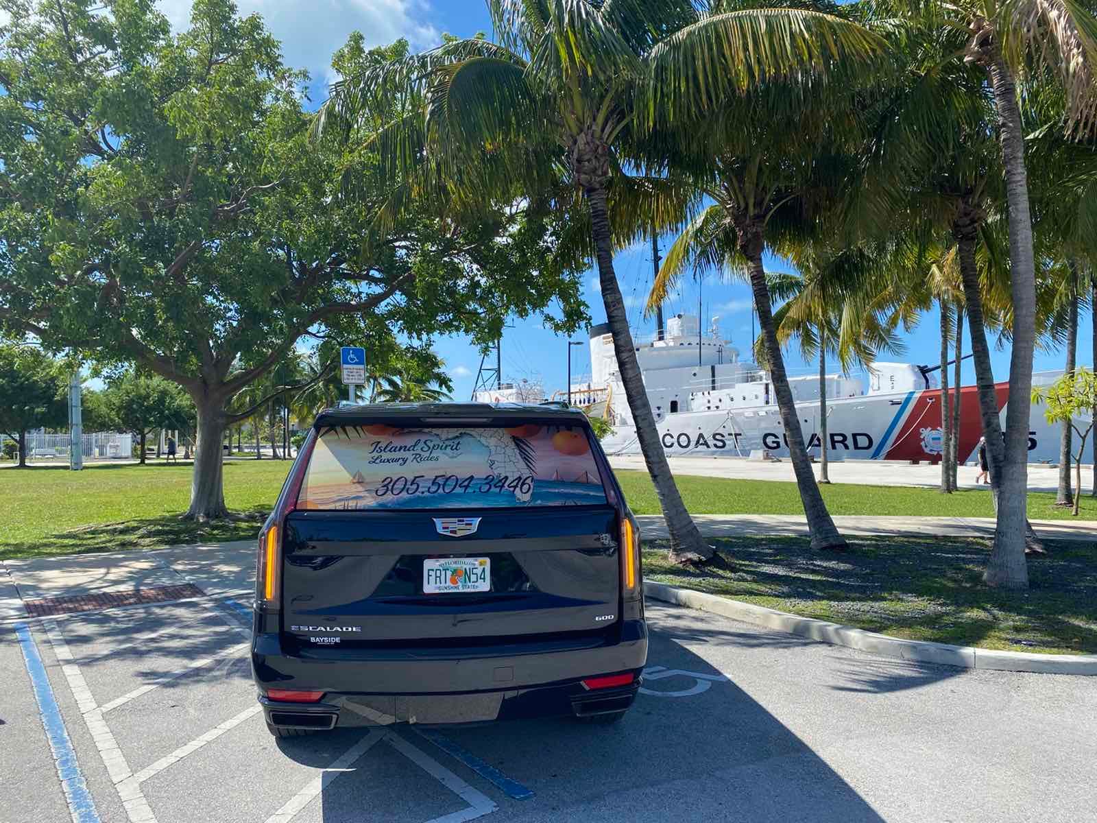 Island Spirit Cadillac Escalade near the Key West Coast Guard cutter