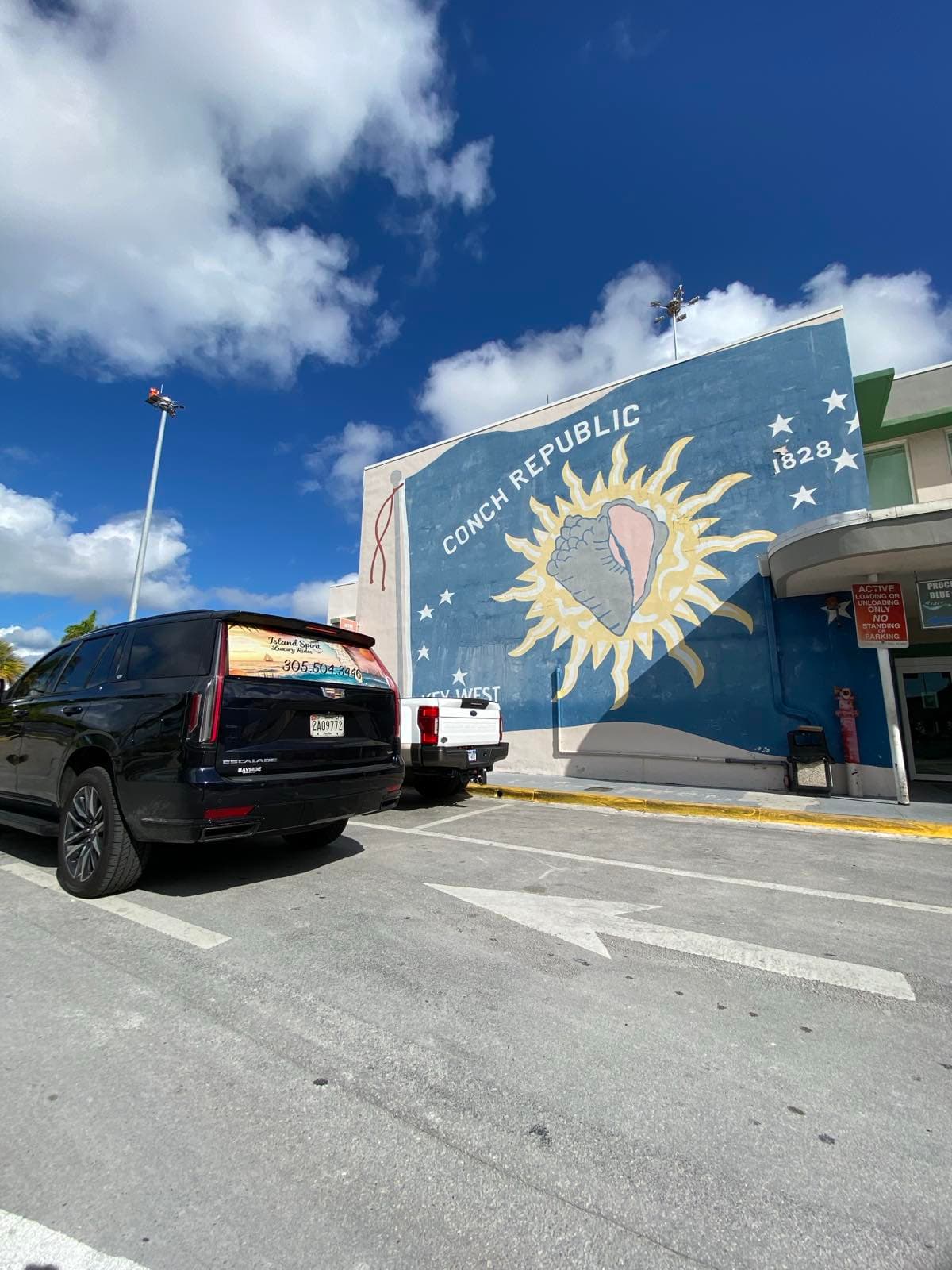 Island Spirit Cadillac Escalade at the Conch Republic mural