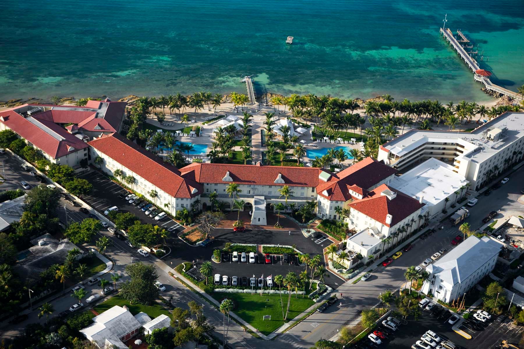 Key West resort entrance surrounded by tropical landscaping